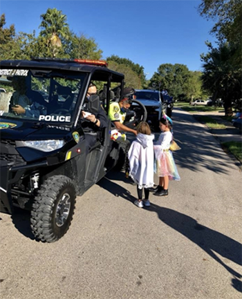 Patrol Officer Interacting with Children