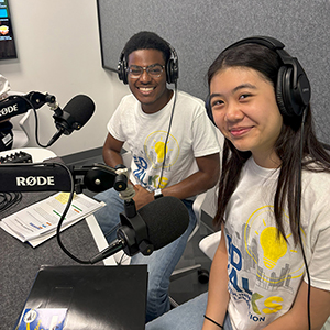 Two Teens Wearing Headphones