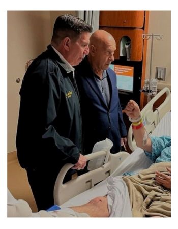 Mayor and Fire Chief Visiting Firefighter in the Hospital