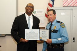 HPD Chief Charles McClelland, Jr. presents Lt. Harry Zamora with the Medal of Valor