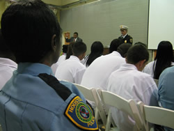 Assistant Chief B. J. Lumpkin addresses graduates